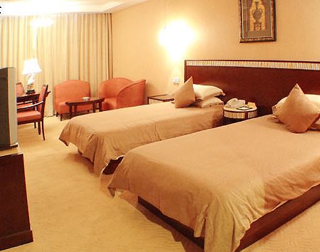 New Overseas Chinese Hotel Čou-šan Pokoj fotografie